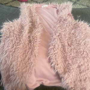 Self esteem pink fur vest.